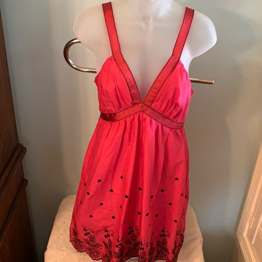 Hot pink sundress with embroidered hem